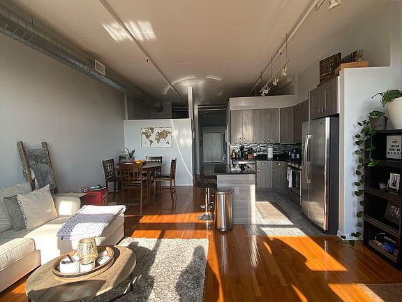 Living room, dining area and kitchen