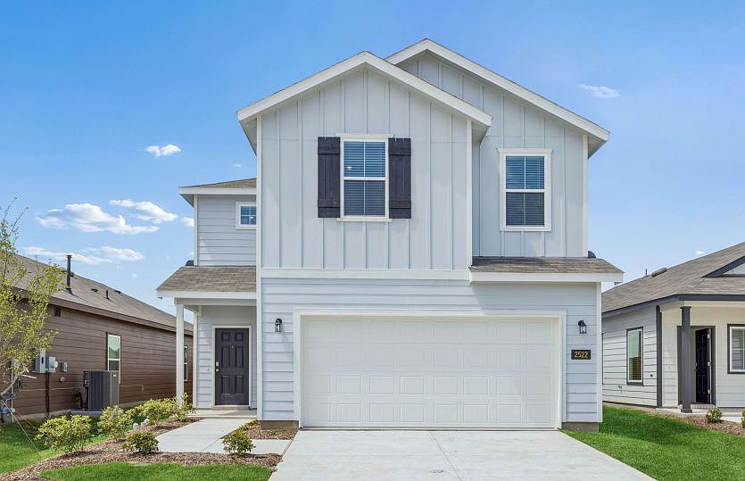 The Comal, a two-story home with 2-car garage