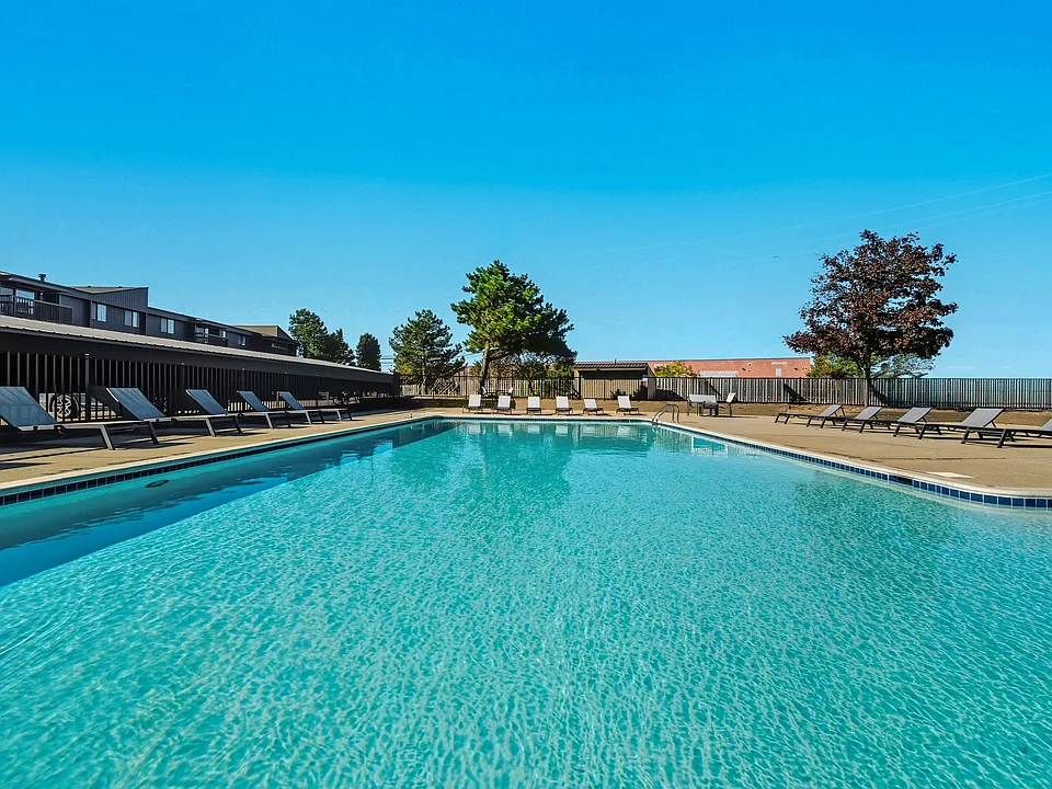 Sparkling Swimming Pool and Sun Deck at Franklin River Apartments in Southfield, MI