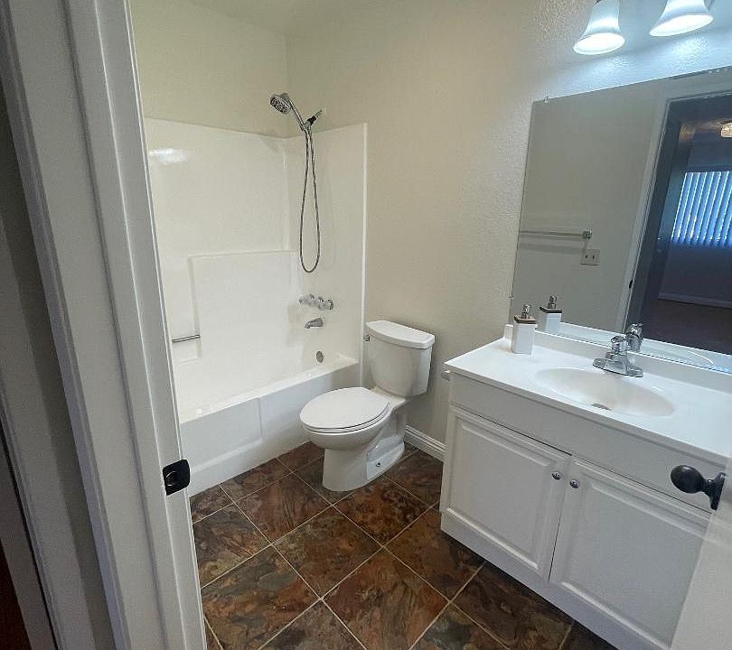 Two Full Bathrooms, New Fiberglass Shower Tubs.