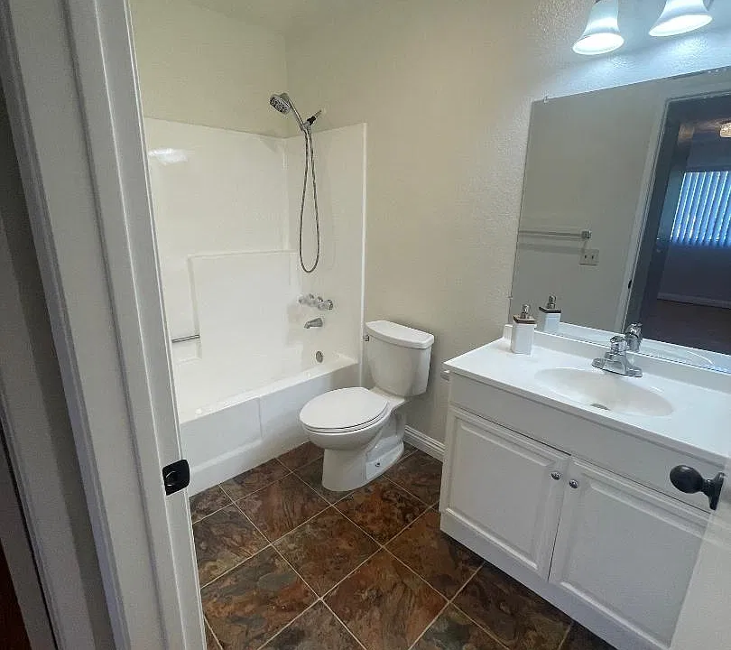 Two Full Bathrooms, New Fiberglass Shower Tubs.