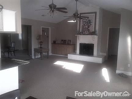 Living Room
						:
						Gas Log Fireplace in Living Room, French Doors to back yard . Dual Fan/Lights