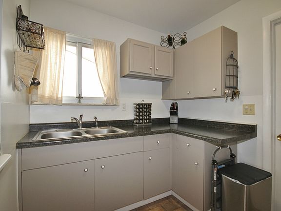 High durability and easy care are found with the newer flooring throughout the kitchen. This kitchen has been designed with cooking function in mind. 