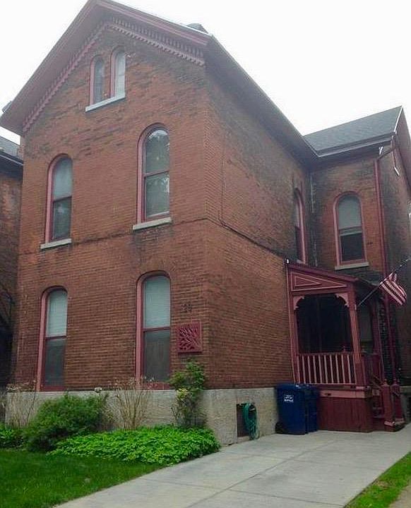 Front of home with parking space