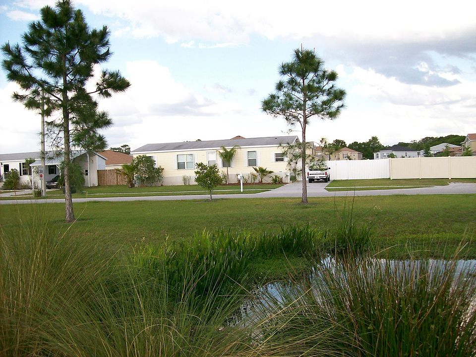 VIEW FROM IN FRONT OF LAKE ACROSS STREET