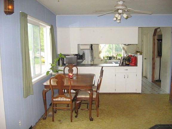 Another view of Kitchen, great lighting, lots of cabinets.
