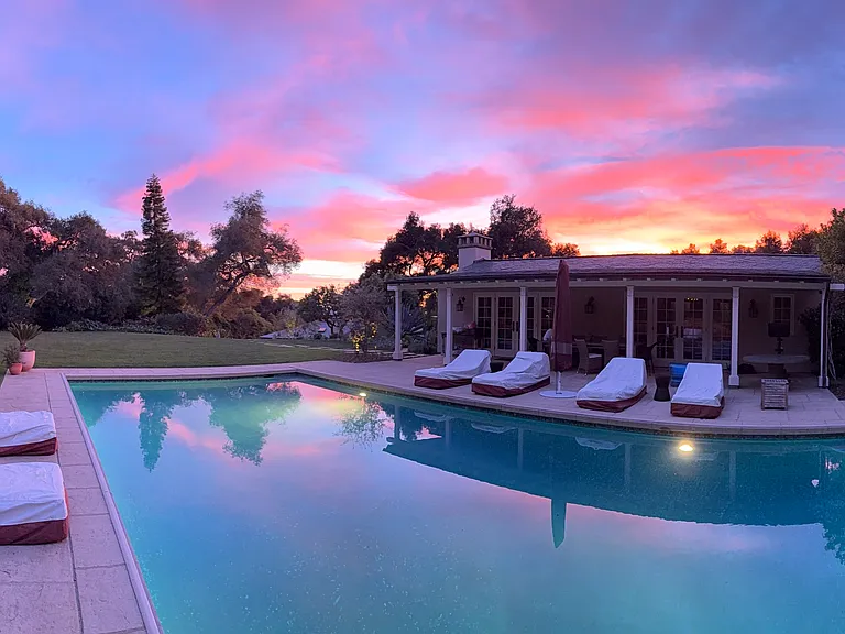 Just completed addition to the pool area includes more pool seating, water feature, patio and all new pool furniture. Glorious sunsets and glimpses of the Chanel Islands and ocean from this area.