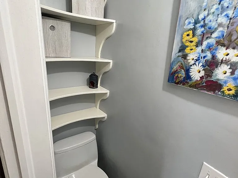 small lavatory in main rental bedroom (west)