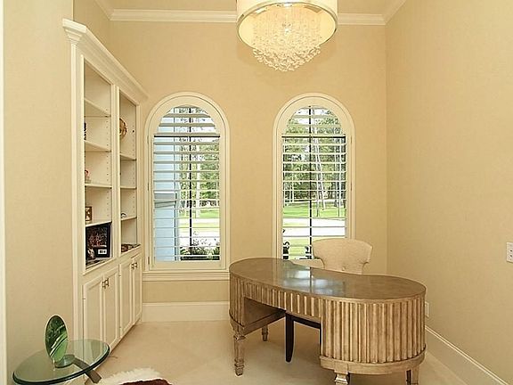 THIS IS THE PLACE WHERE YOUR MAJESTY, THE QUEEN OF MASTERS CIRCLE, WILL HANDLE HER FORMAL DUTIES! STUDY HAS BUILT IN SHELVES, SHUTTERS ON WINDOWS, CROWN MOULDING AND AN ELEGANT CHANDELIER ESPECIALLY DESIGNED FOR HER!!