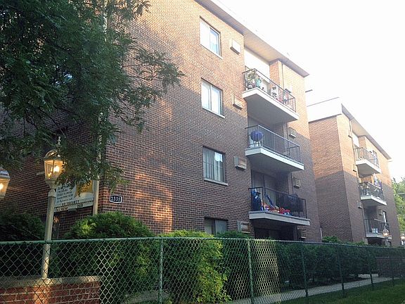 Beautiful brick building with elevator and laundry in basement for your convenience