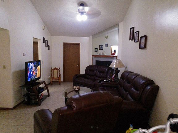 Living Room with high Ceilings, & Fireplace