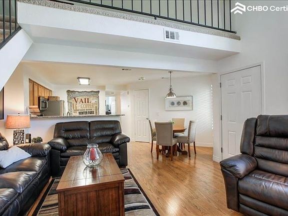 Living room with loft above