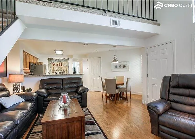 Living room with loft above