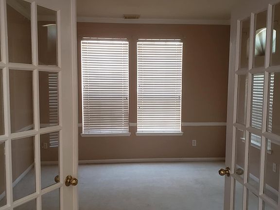 Room 1 - Located in the first floor with double french doors