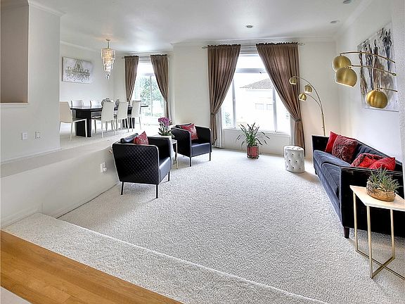 View of the formal living and dining rooms from the front entry.