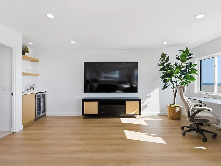 First level offers working and lounge area with full bathroom and wet bar.