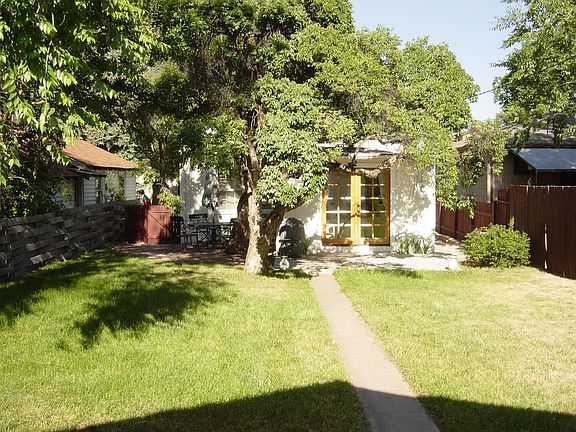 French Doors Open To Large Backyard