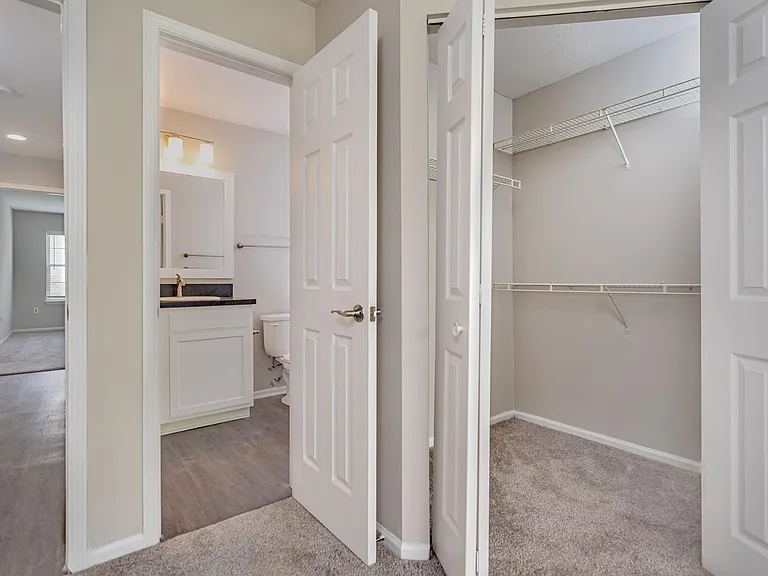 The Glenmount Primary Bedroom closet and bathroom