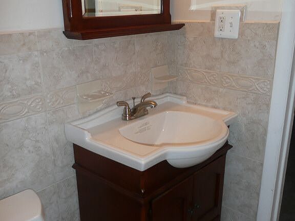 New Tile bathrooms 
