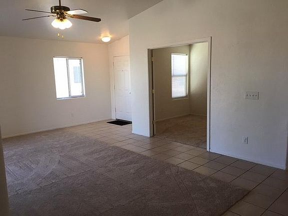 Living Room looking into Den/4th Bedroom and at Front Door