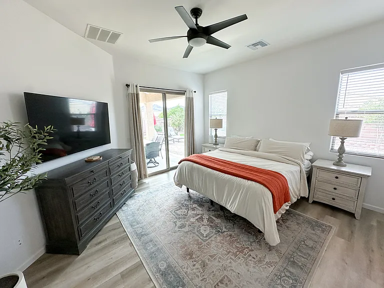 Primary Suite w/private access to backyard.