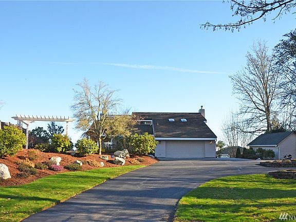 Enter the driveway from Ridgeview and drive back to your .69 acre of beautifully landscaped grounds. Plenty of parking for you and your guests!