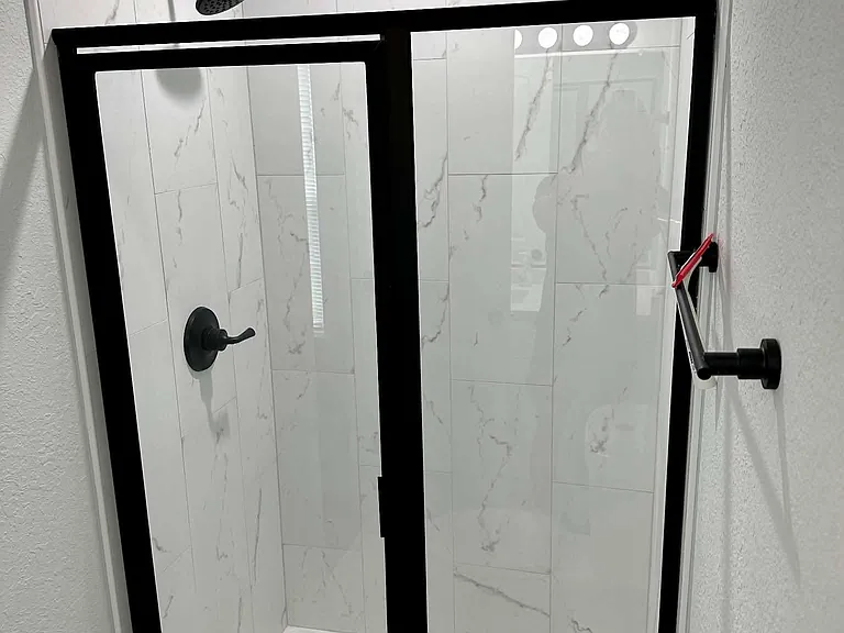 Bathroom #3 also contains a modern walk in shower, perfect for visitors.