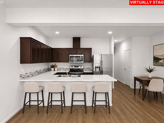 5th image of 2138 NE Four Seasons Ln