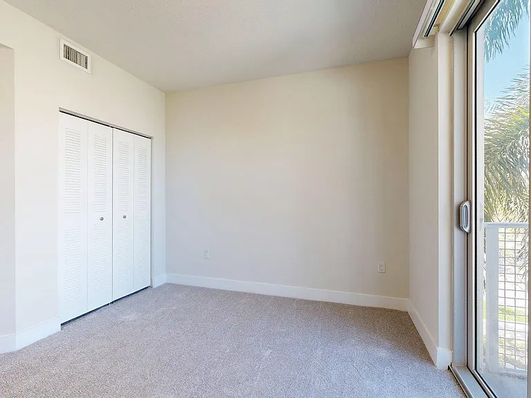 Spacious apartment Bedroom with Carpet Floor.