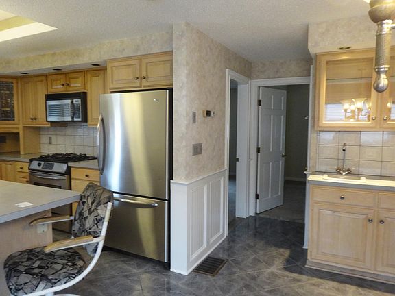 Kitchen with entrance to 2 smaller bedrooms