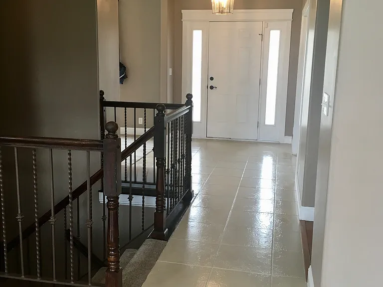 Entry with brand new epoxy coated tile throughout entry way.
