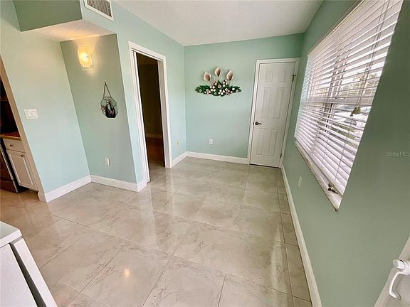 4th image of 10034 64TH AVENUE N #11