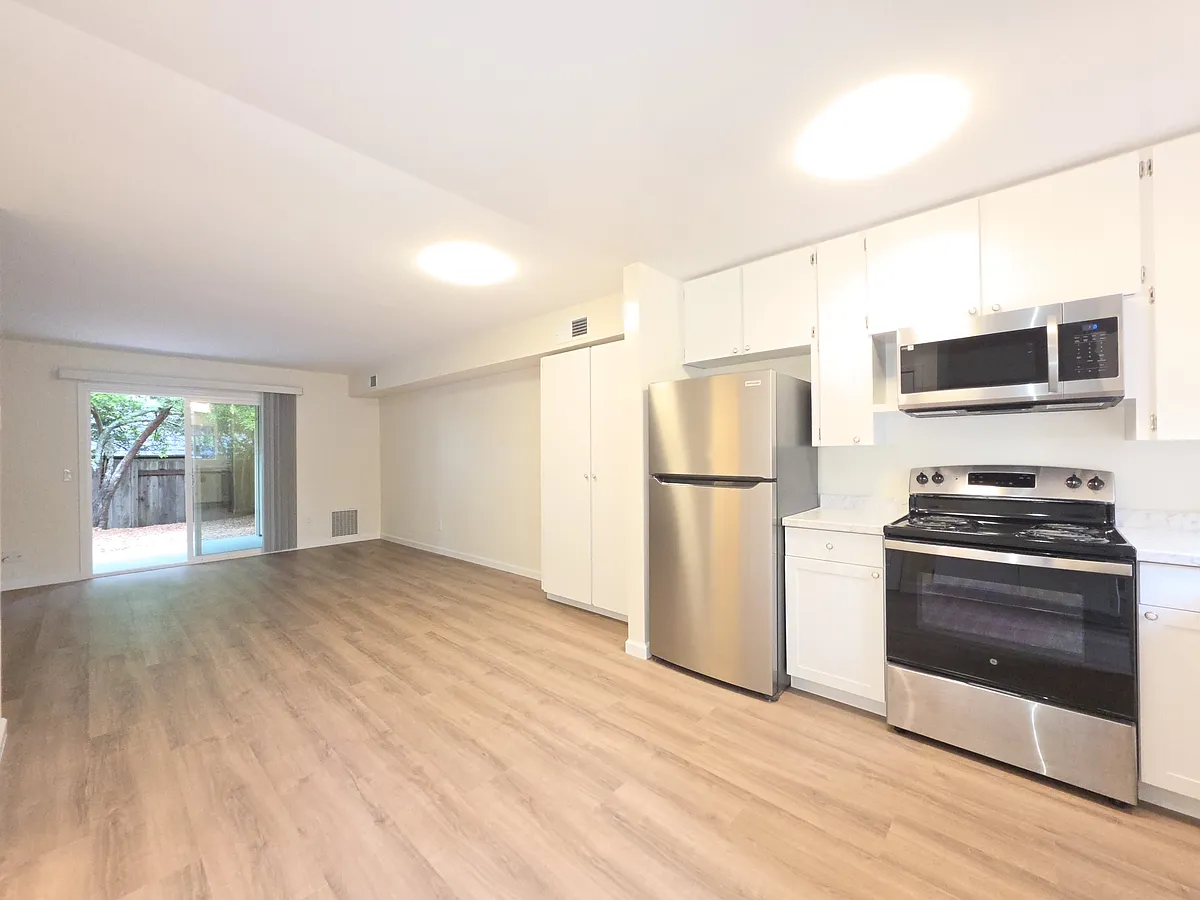 First Floor View From Front Door to Rear Thermal Pane Patio Sliding Door - 8734 Lund Hill Ln #35