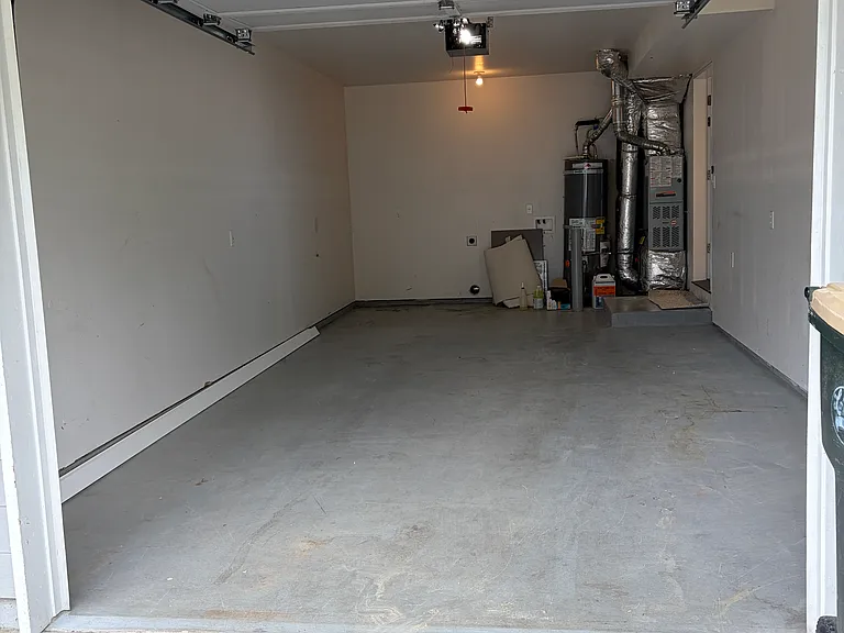 Welcome to your own garage! Plenty of space to park, PLUS washer/dryer hook ups.