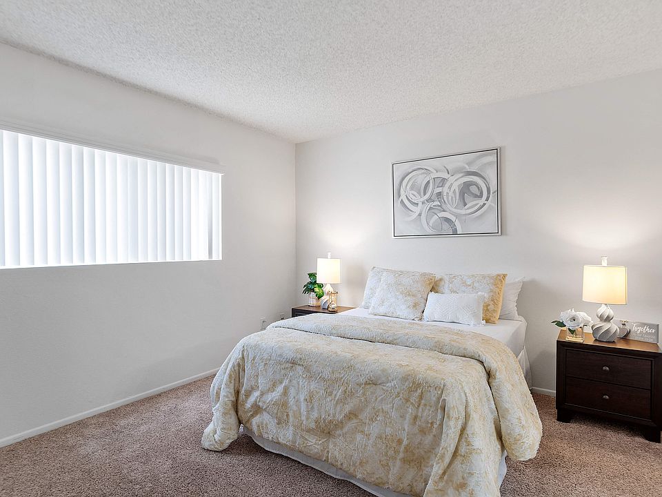 Bedroom in a one bedroom apartment with ample natural light at the Riverview Apartments in Sherman Oaks