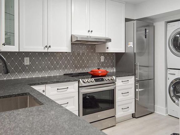 New LG appliances, induction range, mid-volume exhaust fan (not a recirculating microwave!) that whisks smoke and food smells out of the apartment. Full size washer/dryer!