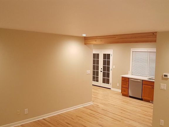 Living room facing kitchen