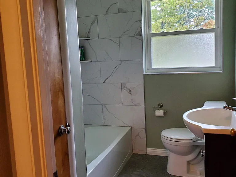 The bathroom was fully renovated in 2022 with all new tile work.