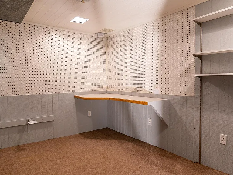 Hidden room downstairs for storage, arts and crafts or music area, or a quiet desk away from the rest of the house for studying.