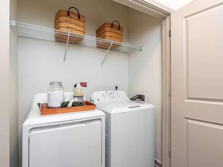Washer and dryer in apartment.