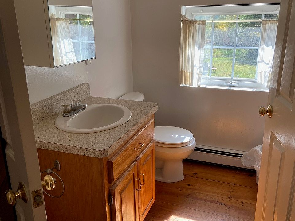 Bathroom includes tub and shower