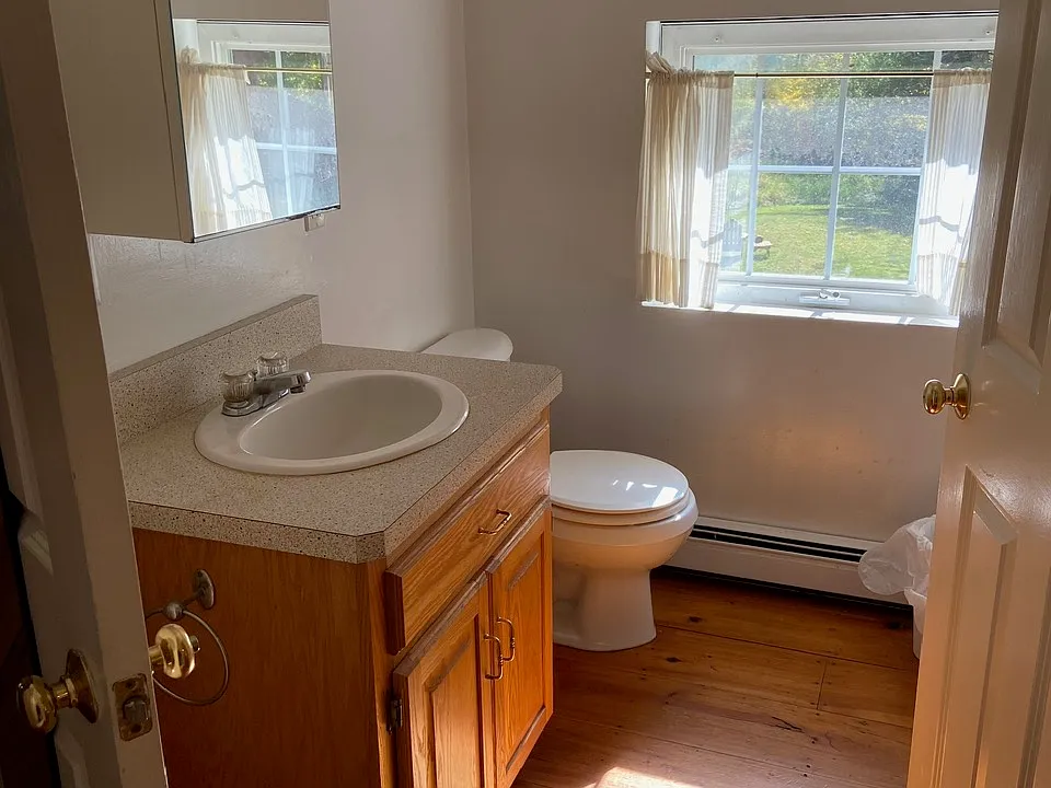 Bathroom includes tub and shower