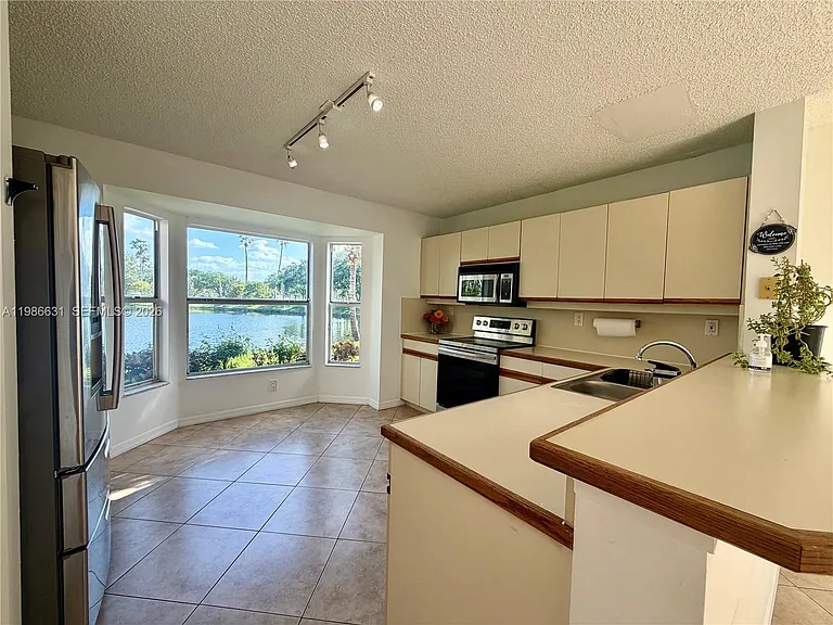 12619 NW 11th Pl — Photo 49