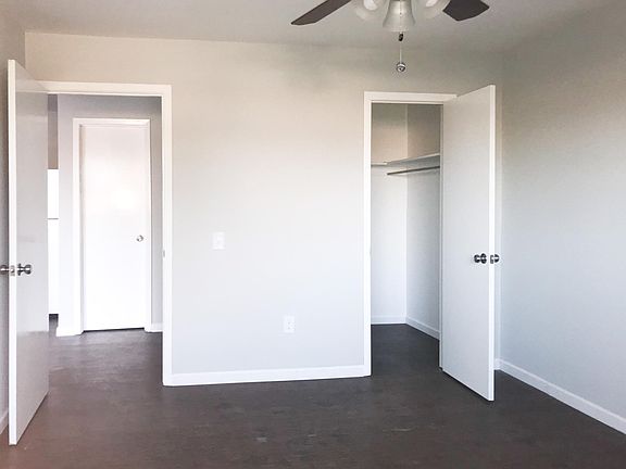Master Bedroom; walkin closet, ceiling fan, large picture wi