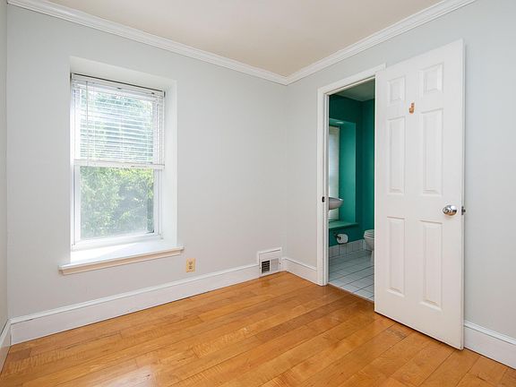Small 3rd floor bedroom/office

Can fit a full sized bed, tall dresser, and clothes rack.
