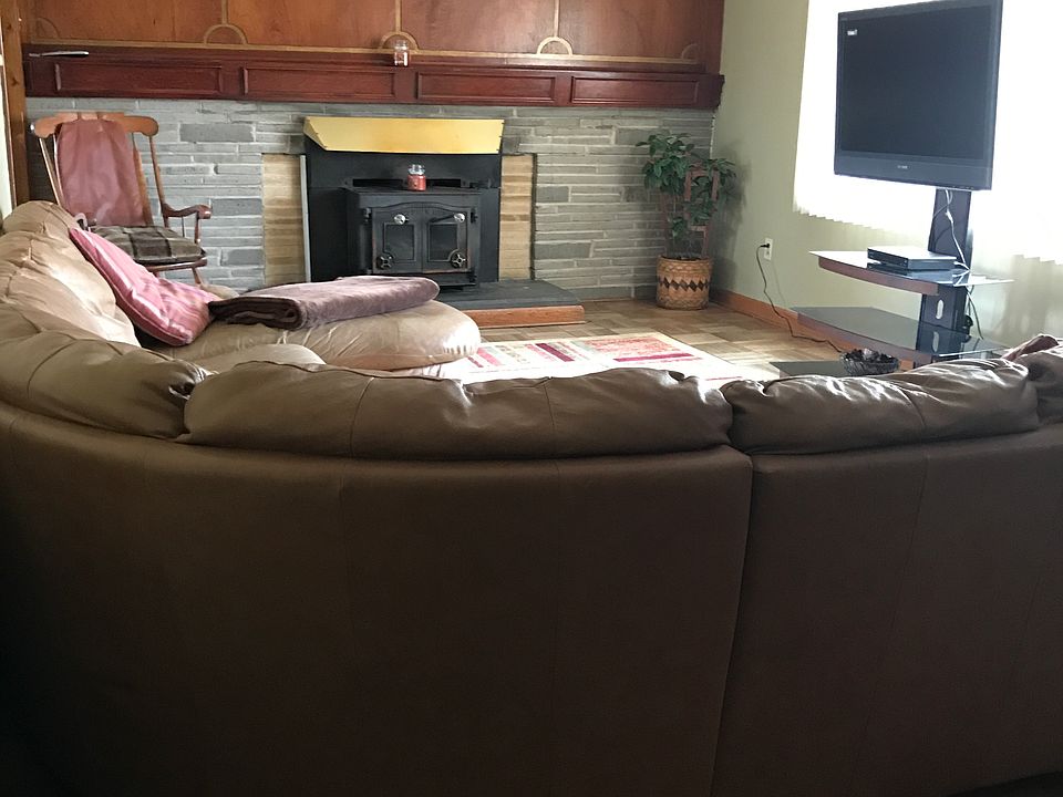 Living room w/ wood burning stove