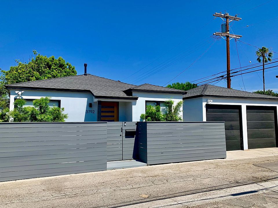 Front of house. One car garage comes with the space. 2nd Garage is used by other tenant