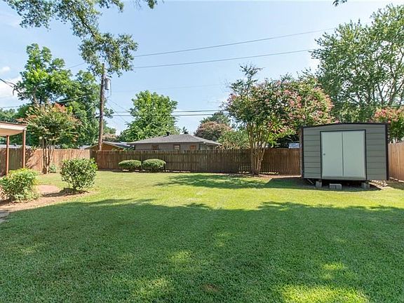 Backyard with Large Storage Shed