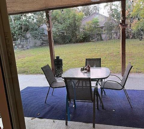 Covered Patio and Large Backyard