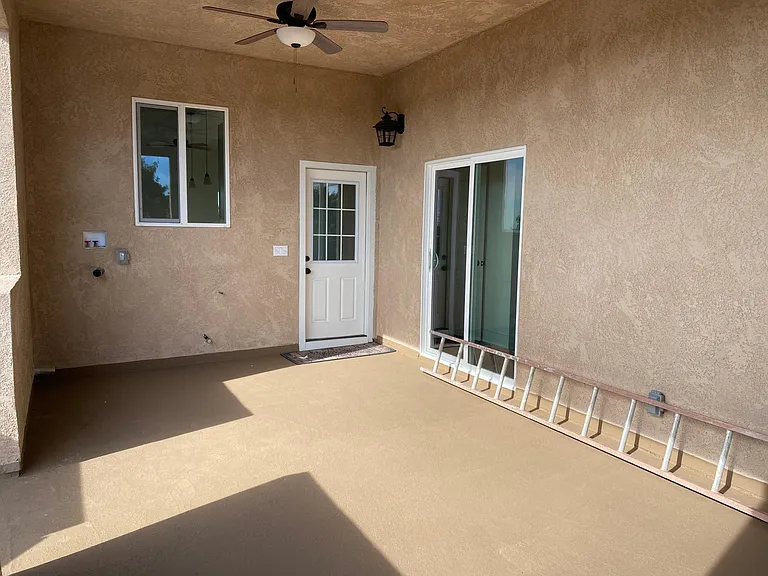 Covered Balcony. Sliding door leads to Bedroom 3